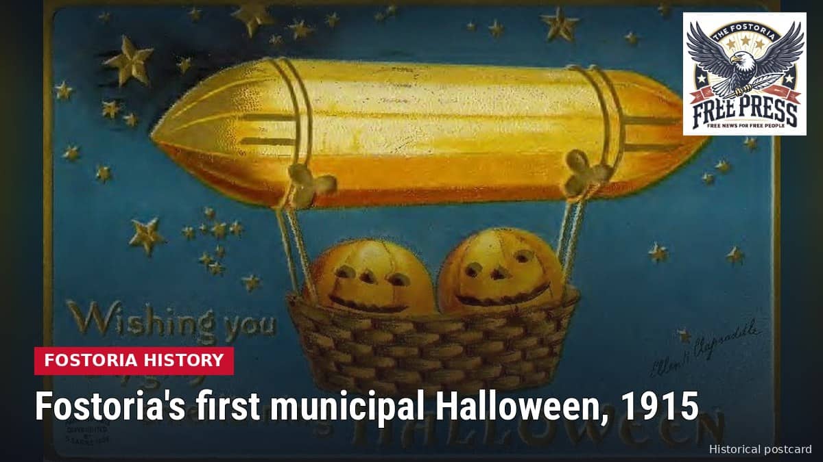 Fostoria News: 1908 Halloween postcard showing two smiling jack-o-lanterns riding in the basket of a golden airship under a starry sky, with the greeting Wishing you a highly entertaining Halloween